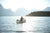 mycanoe solo folding boat and 1-person canoe on water in sunlight