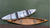 mycanoe-origami-boat-and-traditional-wood-canoe-on-the-water