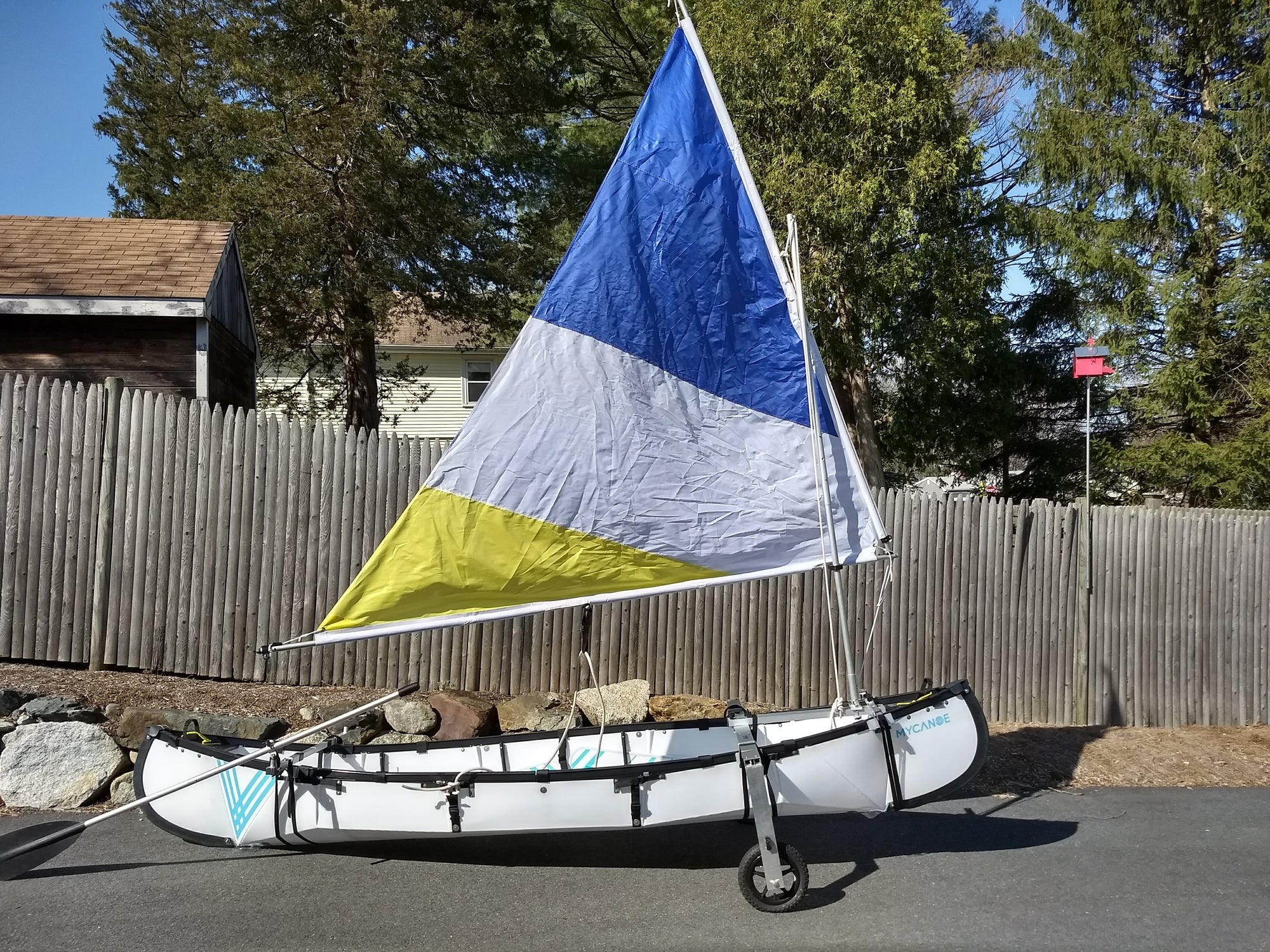 mycanoe duo 2 person folding canoe with sail on trailer