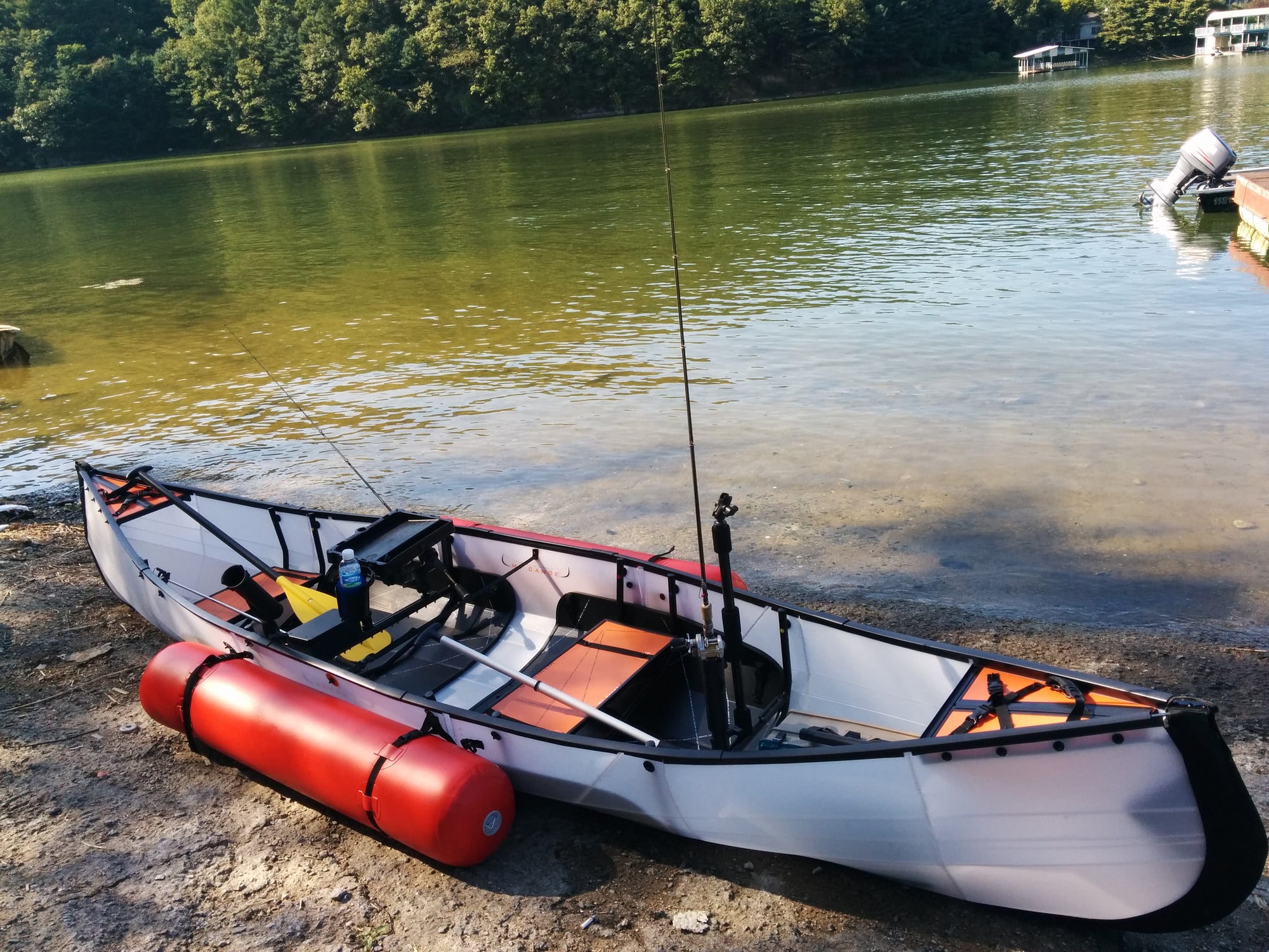 mycanoe duo folding 2-person canoe with red stabilizer