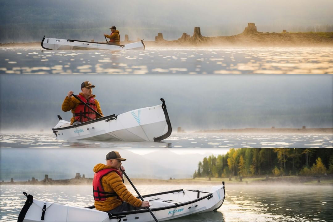 Man paddling foldable kayak on foggy lake 
